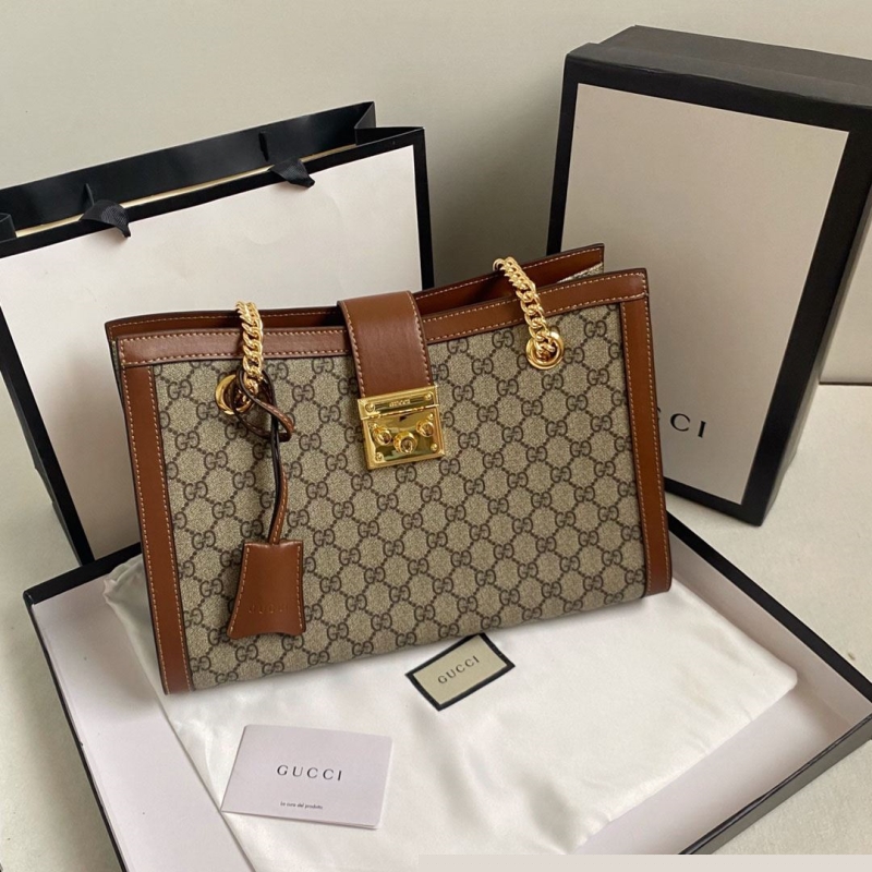 G*u*i shopping bags